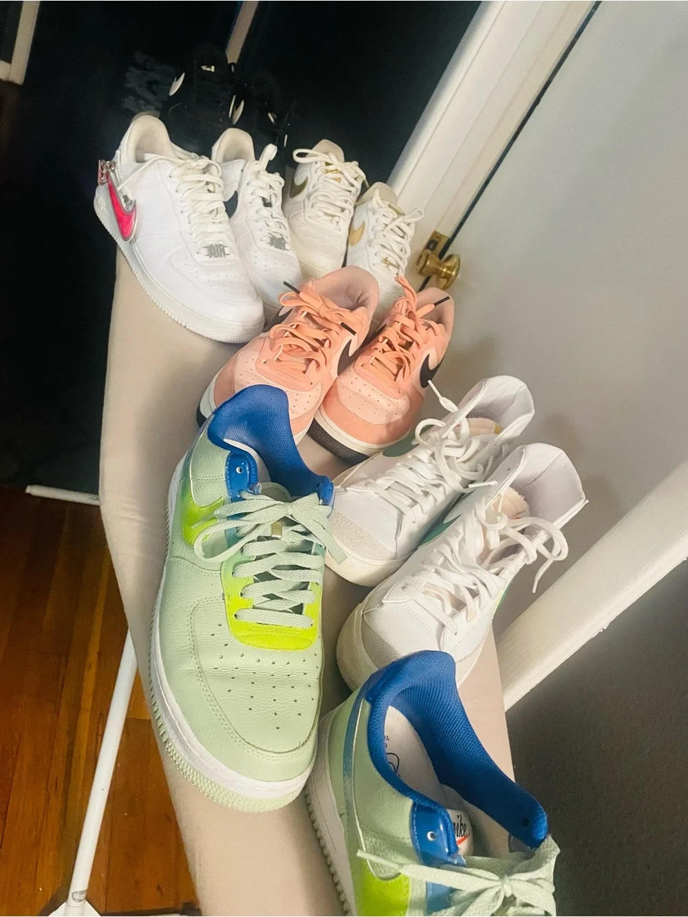 Nike Kids White Sneakers with Gold Swoosh